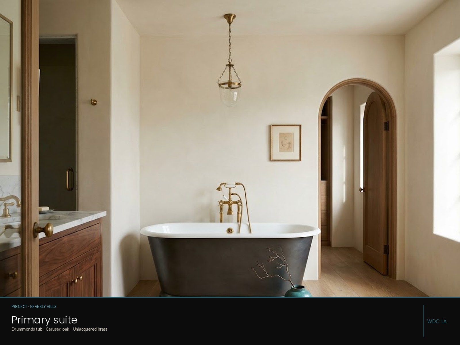 Beverly Hills primary bath — bookmatched stone, honed marble, double vanity
